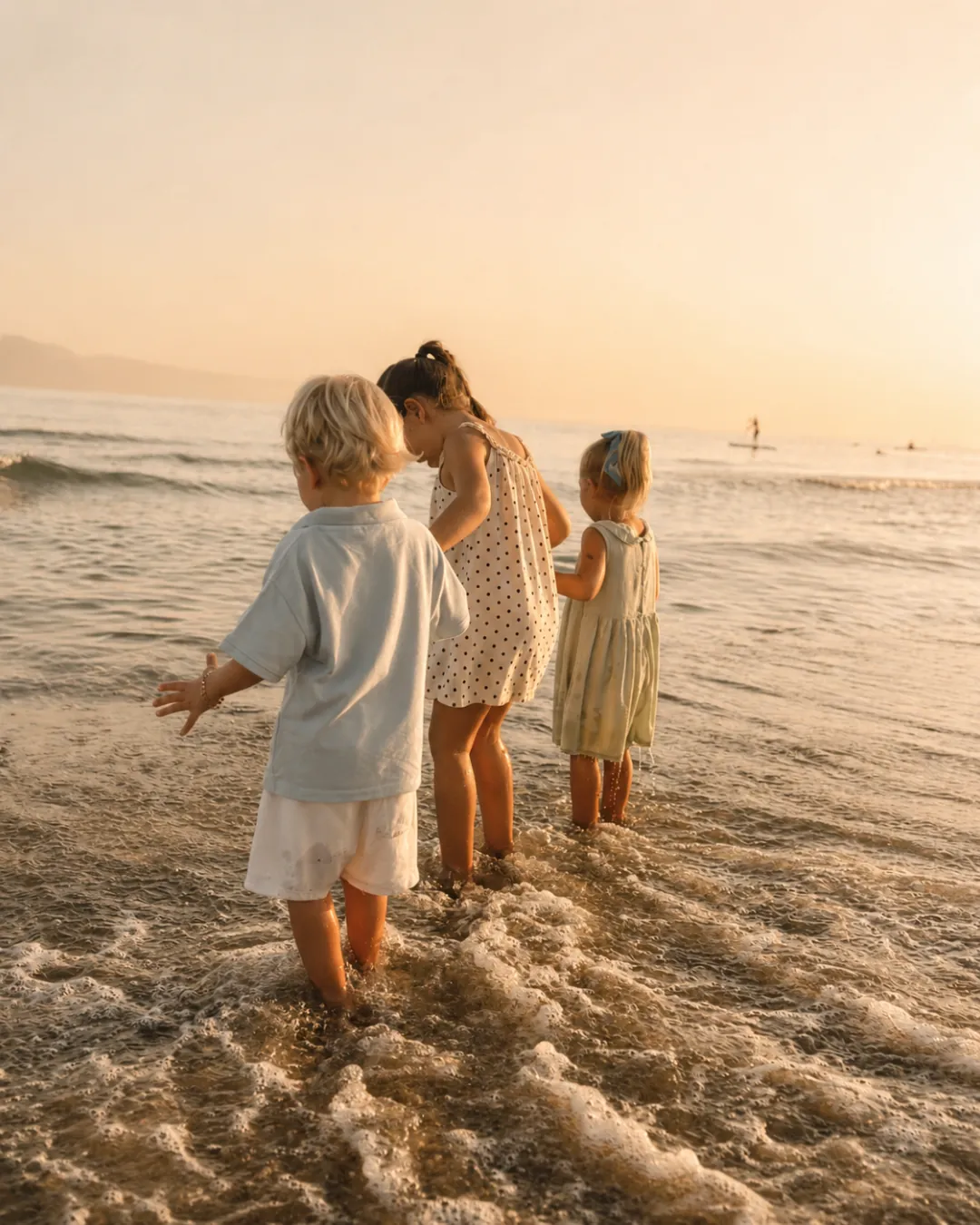 A small group of children exploring together, unhurried.